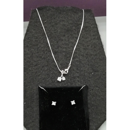 166 - 925 Silver Cubic Zirconia Necklace and Earrings Set.