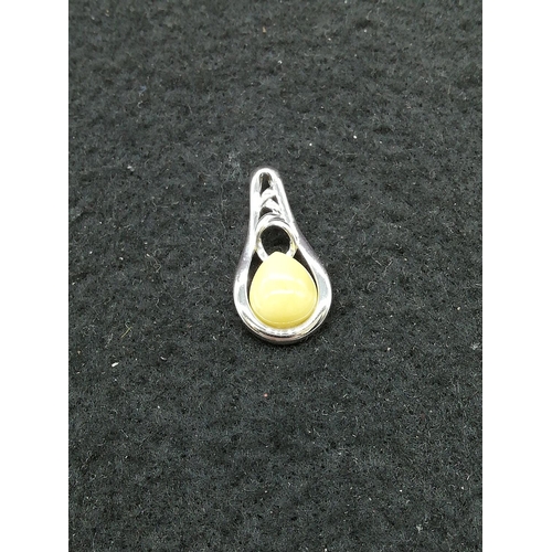 179 - Sterling Silver and Amber Pendant.