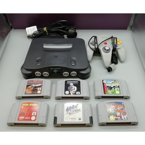 208 - Nintendo 64 plus 6 Games. Complete. W/O