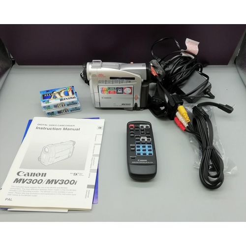 221 - Cannon MV300 Camcorder with accessories - Boxed.