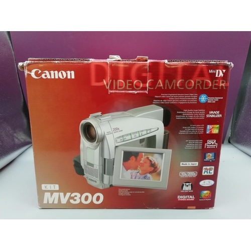 221 - Cannon MV300 Camcorder with accessories - Boxed.