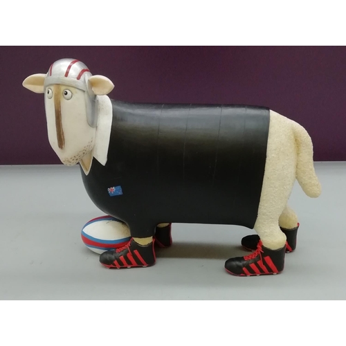 228 - Enesco Sheep Figure 'Rugby Player'. 15cm High.