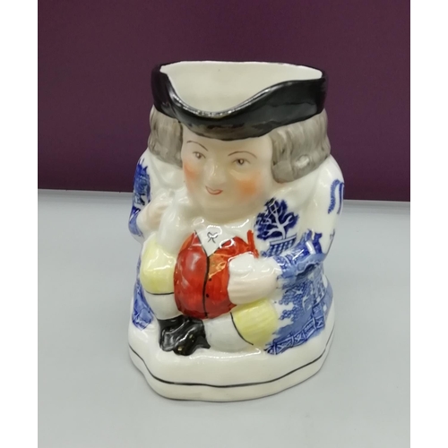 244 - Unusual Toby Jug with Willow Pattern Coat.