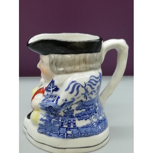 244 - Unusual Toby Jug with Willow Pattern Coat.