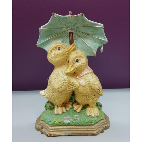 252 - Cast Iron Doorstop of Ducks under Umbrella.