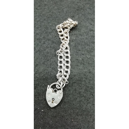 275 - 925 Double Link Charm Bracelet. Requires Safety Chain.