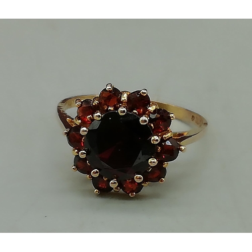 141 - Red Stone Set 9ct Hallmarked Ladies Ring. Size N. 2.32 Grams.