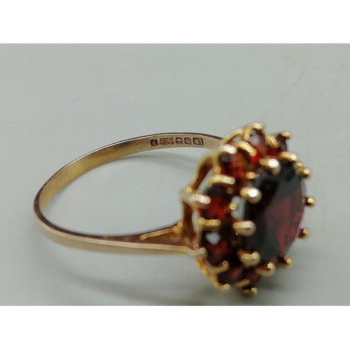 141 - Red Stone Set 9ct Hallmarked Ladies Ring. Size N. 2.32 Grams.