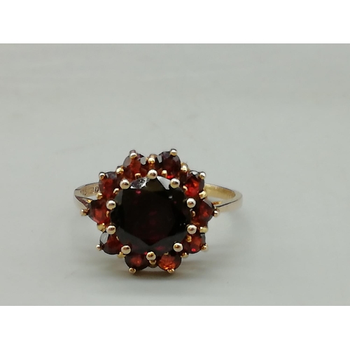 141 - Red Stone Set 9ct Hallmarked Ladies Ring. Size N. 2.32 Grams.