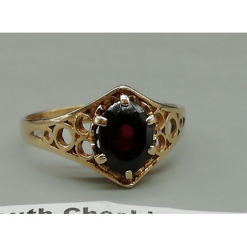 172 - Red Stone Set 9ct Hallmarked Ladies Ring. Size Q. 2.3 Grams.