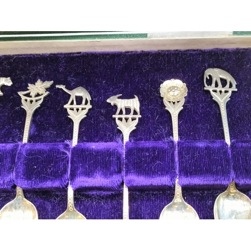 82 - Cased Set of 12 Teaspoons with Middle Eastern/Indian Animal and Flower Handle. Unmarked. Tested As S... 