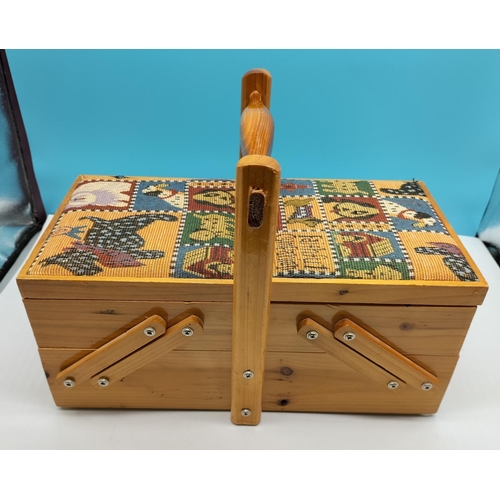 541 - Cushion Topped Cantilever Sewing Box. 35cm x 18cm x 15cm.