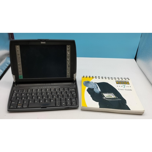 726 - Psion Series 7 Hand Held plus Book. Untested.