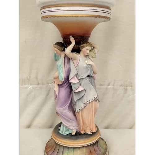 157 - Three Graces Ceramic Oil Lamp. 68cm High. Repairs to Neck and Arm.