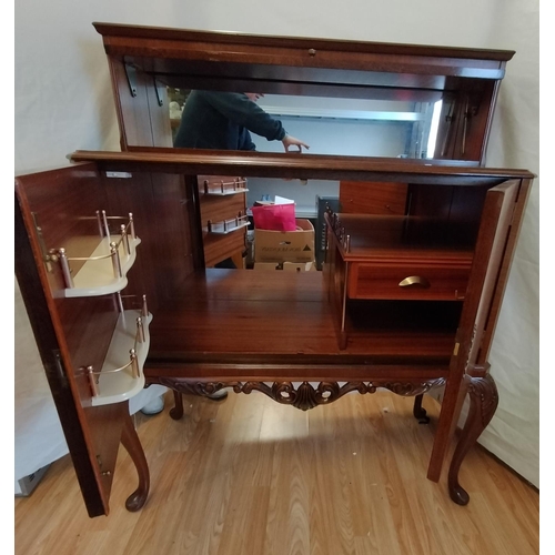 23 - Flamed Mahogany (Doors) & Mahogany Drinks Cabinet. 129cm High, 103cm x 45cm. This Lot is Collection ... 