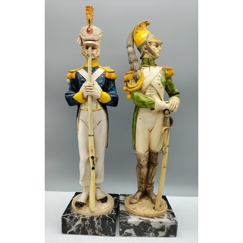 17 - Pair of Depose Soldier Figures on Carrara Marble Base. 36cm High.