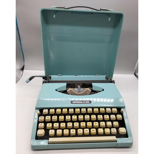 22 - Imperial 200 Light Blue Portable Typewriter.