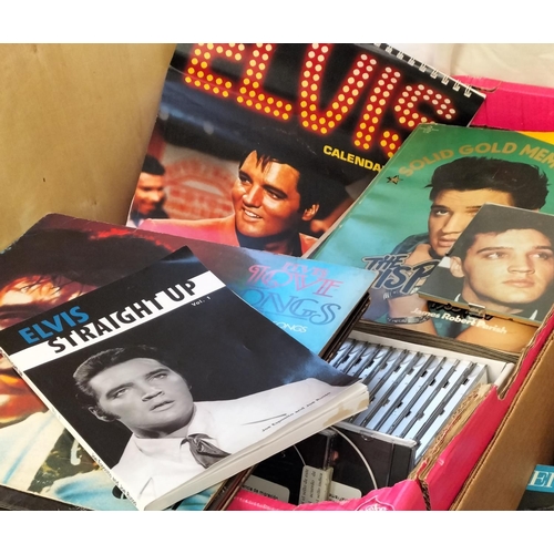 101 - 3 Boxes of Mixed Elvis Memorabilia to include Books, CDs, VHS Tapes, Magazines, Calendar, etc.