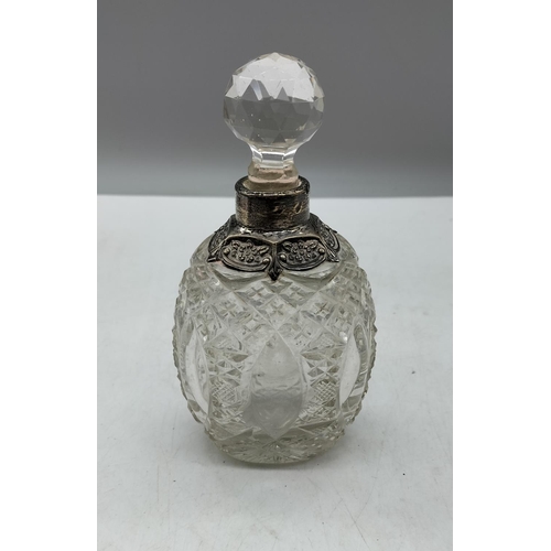 134 - Hallmarked Silver Collar Cut Glass Bottle. 15cm High.