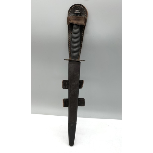 137 - Commando Dagger in Sheath. 29cm Long. Collection Only. Age ID Required.