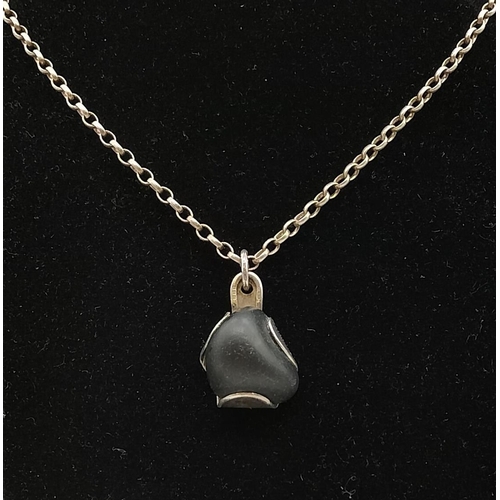 255 - Hallmarked Silver 'Basalt' Stone from Easter Island on Silver Belcher Chain.