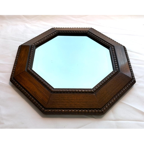 289 - Mid Century Octagonal Dark Oak Framed Wall Mirror with Bevelled Edge Glass. 42cm at Widest Point.