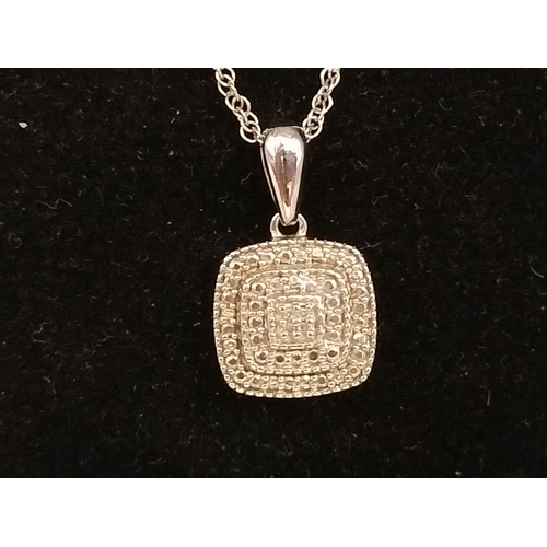 296 - Silver and Diamond Pendant. Marked 925 Dia to Loop.