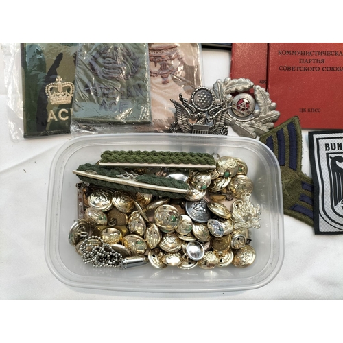 315 - Box of Assorted Military Items to Include Sausage Bag, Patches, Badges, Headphones, Cloth Flying Hel... 