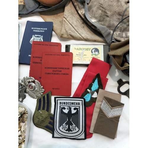 315 - Box of Assorted Military Items to Include Sausage Bag, Patches, Badges, Headphones, Cloth Flying Hel... 