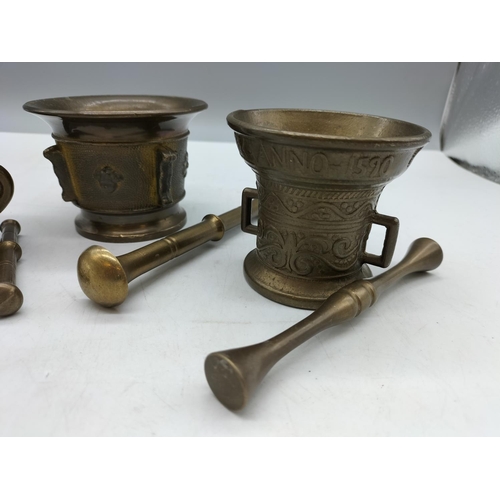 33 - Brass Pestle and Mortars in Different Designs (3). 7.5cm High.