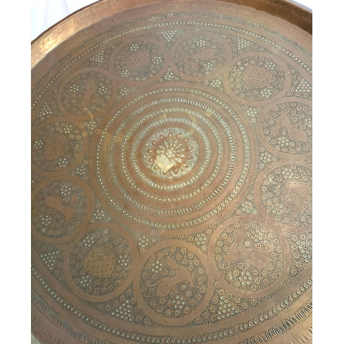 347 - North African Etched Brass Topped Folding Table. 58cm Diameter, 58cm High.