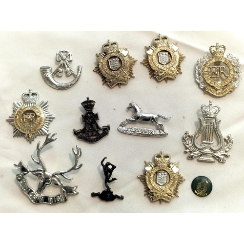 37 - Assortment of Military Badges.