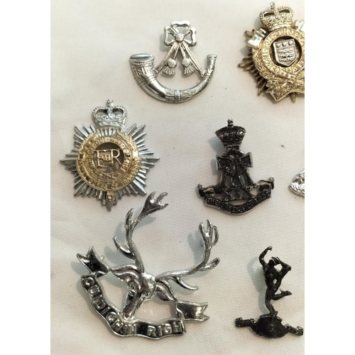 37 - Assortment of Military Badges.