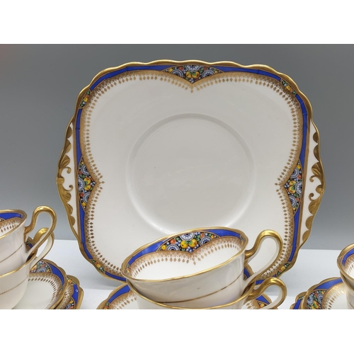 66 - Standard Bone China 21 Piece Tea Set to include Trios (6), Milk, Sugar and Bread and Butter Plate. 1... 