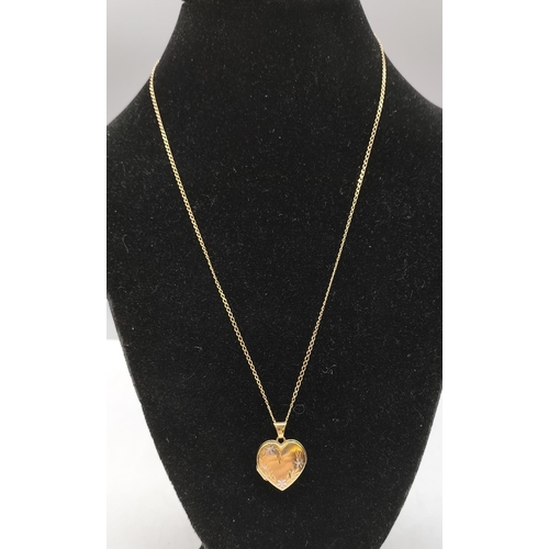 94 - 9ct Gold Heart Locket and Necklace. 3 Grams.