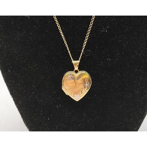 94 - 9ct Gold Heart Locket and Necklace. 3 Grams.