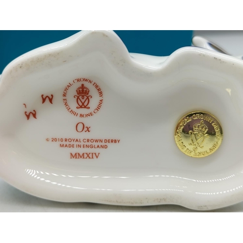 100A - 2 x Royal Crown Derby Chinese New Year Paperweights 'Ox' (date marks for 2014) and 'Tiger' (date mar... 