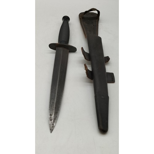 137 - Commando Dagger in Sheath. 29cm Long. Collection Only. Age ID Required.