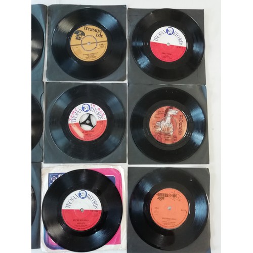 31 - Reggae, Collection of 11 7ich single records includes artists Derrick Morgan, Horace Faith, Nicky Th... 