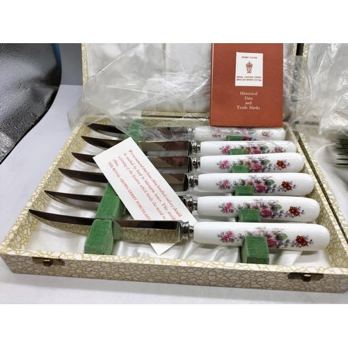 528 - Royal Crown Derby Knife and Forks Sets. Boxed. Forks A/F, Splits to Handles.