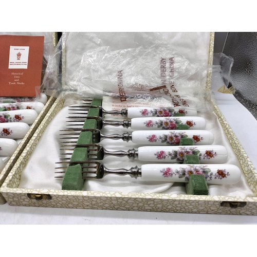 528 - Royal Crown Derby Knife and Forks Sets. Boxed. Forks A/F, Splits to Handles.