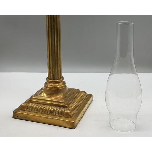 312 - Columned 51cm Brass Oil Lamp and Funnel.