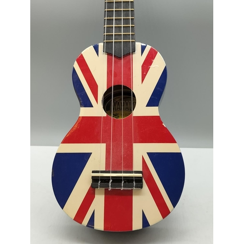 488 - Union Jack Child's Guitar. 52cm Long.