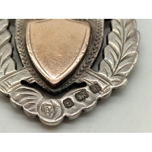 775 - Hallmarked Silver and Rose Gold Fob.