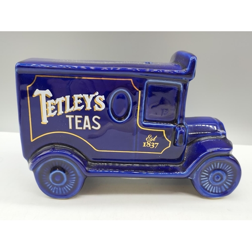 815A - Tetley Tea Truck Money Box, Clock and Gaffer Mug.