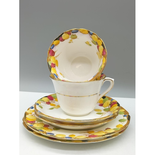 961 - Royal Doulton Trios (4) in the Art Deco 'Honesty' Pattern. Chip to 1 Plate.