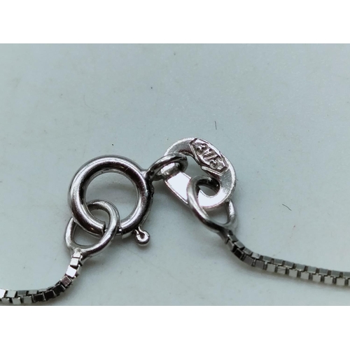 7 - 9ct White Gold and Diamond Heart Necklace.