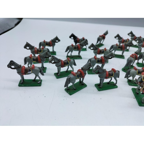 110A - Approx 33 Hand Painted Lead Horses.