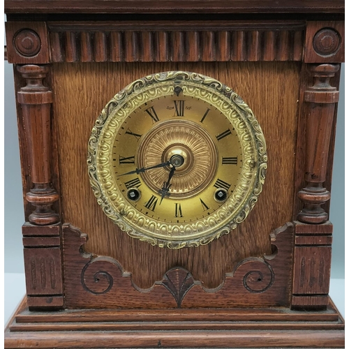 160C - Ansonia Clock Co, New York Oak Cased Mantle Clock. Requires Attention. 36cm High, 35cm x 16cm.