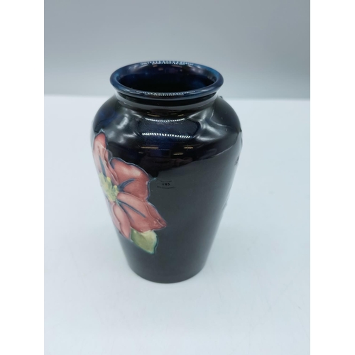 182 - Moorcroft 9cm Vase in the Hibiscus on Blue Design.